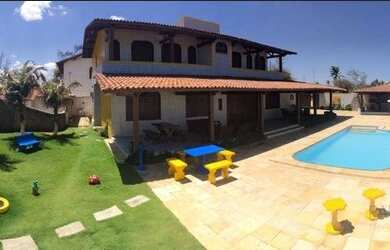 Imagem: A casa possui 5 Dormitórios, 5 Banheiros, 5 Vagas na garagem