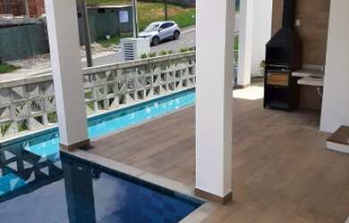 Imagem: A casa em condomínio possui 5 Dormitórios, 2 Banheiros, 4