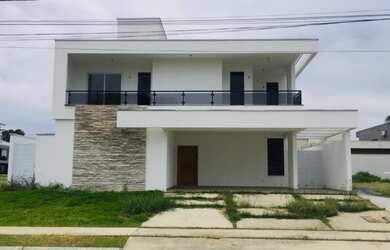 Imagem: A casa em condomínio possui 4 Dormitórios, 4 Banheiros, 4