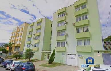 Imagem: O apartamento possui 3 Dormitórios, 1 Banheiro, 1 Vaga na garagem