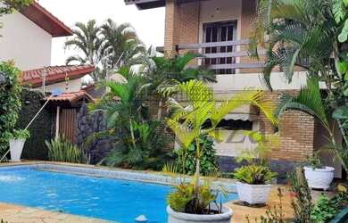 Imagem: A casa possui 3 Dormitórios, 4 Banheiros, 4 Vagas na garagem