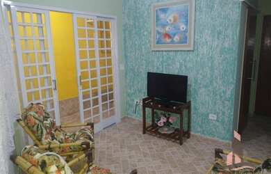 Imagem: A casa possui 2 Dormitórios, 2 Banheiros, 3 Vagas na garagem