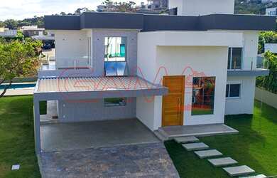 Imagem: A casa em condomínio possui 4 Dormitórios, 3 Banheiros, 4