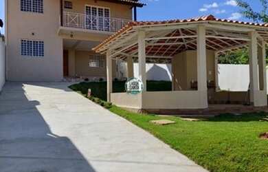 Imagem: A casa possui 4 Dormitórios, 3 Banheiros, 4 Vagas na garagem