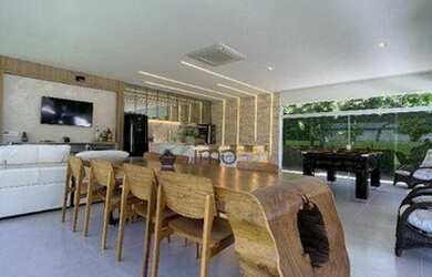 Imagem: A casa em condomínio possui 5 Dormitórios, 5 Banheiros, 4