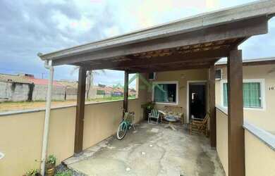 Imagem: A casa possui 2 Dormitórios, 1 Banheiro, 1 Vaga na garagem