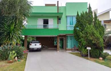 Imagem: A casa em condomínio possui 4 Dormitórios, 3 Banheiros, 283m²