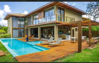 Imagem: A casa em condomínio possui 5 Dormitórios, 5 Banheiros, 4