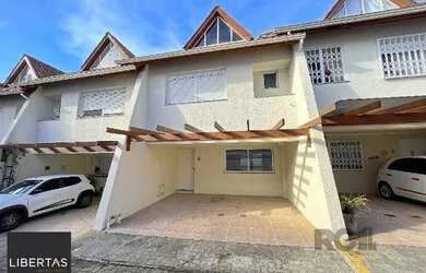 Imagem: A casa em condomínio possui 3 Dormitórios, 3 Banheiros, 2