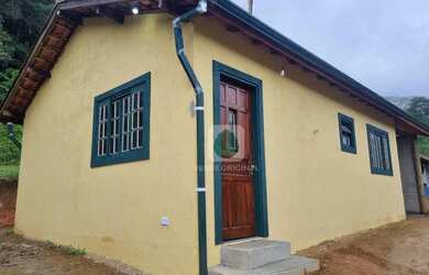 Imagem: A casa possui 2 Dormitórios, 1 Banheiro, 1 Vaga na garagem