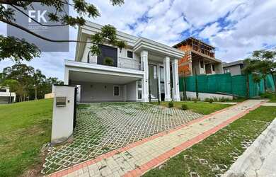 Imagem: A casa em condomínio possui 5 Dormitórios, 5 Banheiros, 5
