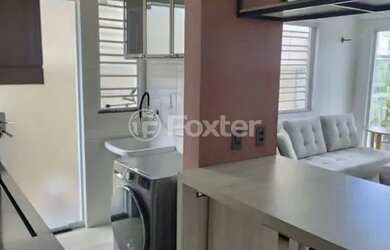 Imagem: O apartamento possui 2 Dormitórios, 1 Banheiro, 1 Vaga na garagem