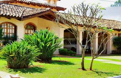 Imagem: A casa em condomínio possui 5 Dormitórios, 5 Banheiros, 5