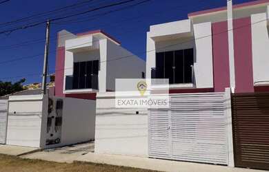 Imagem: A casa possui 2 Dormitórios, 3 Banheiros, 2 Vagas na garagem