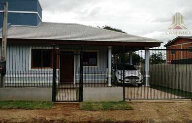 Imagem: A casa possui 2 Dormitórios, 2 Banheiros, 3 Vagas na garagem