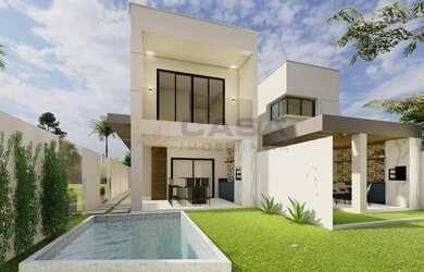 Imagem: A casa possui 3 Dormitórios, 4 Banheiros, 2 Vagas na garagem