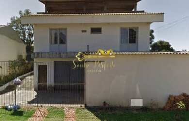 Imagem: A casa possui 5 Dormitórios, 3 Banheiros, 3 Vagas na garagem