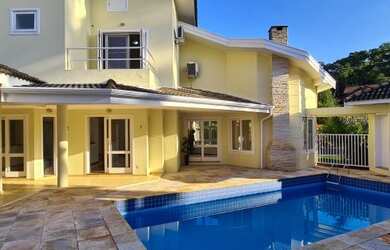 Imagem 1: Casa de Condomínio com 4 Quartos e 6 banheiros à Venda, 379 m² por R$ 1.950.000