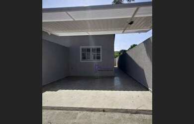 Imagem: A casa possui 2 Dormitórios, 2 Banheiros, 2 Vagas na garagem