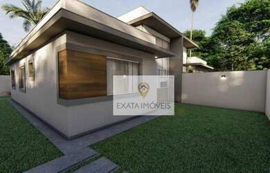 Imagem: A casa possui 3 Dormitórios, 2 Banheiros, 2 Vagas na garagem