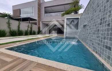 Imagem: A casa em condomínio possui 4 Dormitórios, 5 Banheiros, 3