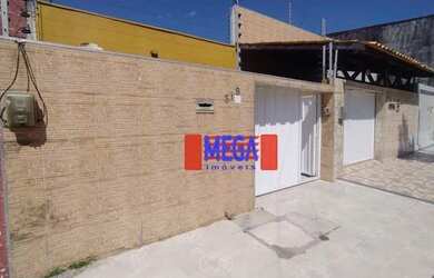 Imagem: A casa possui 4 Dormitórios, 4 Banheiros, 2 Vagas na garagem