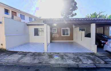 Imagem: A casa em condomínio possui 3 Dormitórios, 1 Banheiro, 2 Vagas