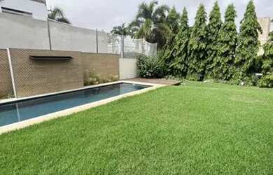 Imagem: A casa em condomínio possui 4 Dormitórios, 4 Banheiros, 5