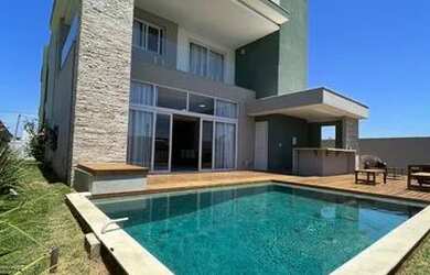 Imagem: A casa em condomínio possui 5 Dormitórios, 5 Banheiros, 4