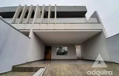 Imagem: A casa possui 3 Dormitórios, 4 Banheiros, 4 Vagas na garagem