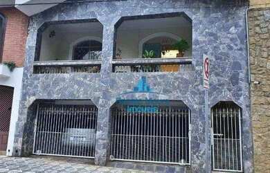 Imagem: A casa possui 3 Dormitórios, 4 Banheiros, 2 Vagas na garagem