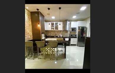 Imagem: A casa em condomínio possui 3 Dormitórios, 2 Banheiros, 2