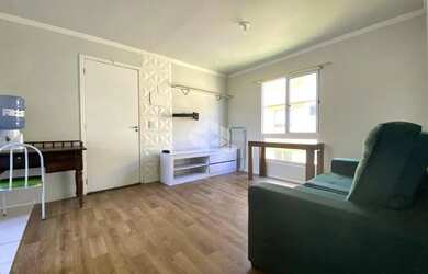 Imagem: O apartamento possui 2 Dormitórios, 1 Banheiro, 1 Vaga na garagem