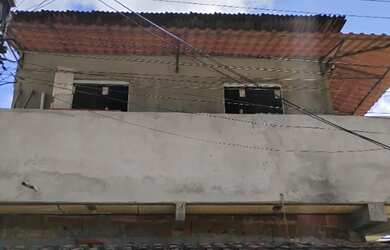 Imagem: Casa com dois quartos, dois banheiros, sala e cozinha e varanda