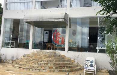 Imagem: A casa em condomínio possui 3 Dormitórios, 3 Banheiros, 263m²