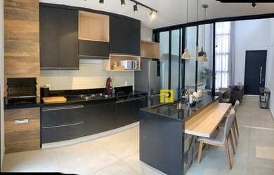 Imagem: A casa possui 3 Dormitórios, 4 Banheiros, 2 Vagas na garagem