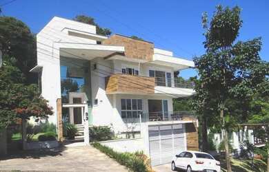 Imagem: A casa possui 4 Dormitórios, 4 Banheiros, 3 Vagas na garagem