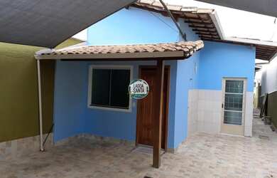 Imagem: A casa possui 3 Dormitórios, 2 Banheiros, 3 Vagas na garagem