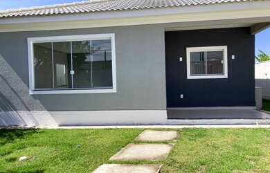 Imagem: A casa possui 3 Dormitórios, 4 Banheiros, 2 Vagas na garagem