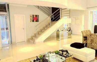 Imagem: A casa em condomínio possui 4 Dormitórios, 5 Banheiros, 3