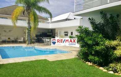 Imagem: A casa em condomínio possui 4 Dormitórios, 5 Banheiros, 4