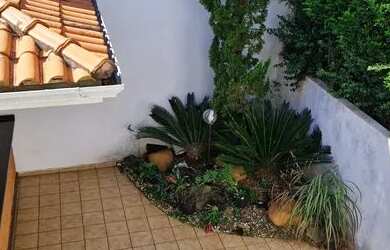 Imagem: A casa em condomínio possui 3 Dormitórios, 2 Banheiros, 4