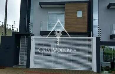 Imagem: A casa possui 3 Dormitórios, 4 Banheiros, 2 Vagas na garagem