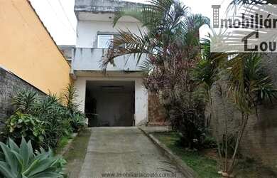 Imagem: A casa possui 2 Dormitórios, 1 Banheiro, 3 Vagas na garagem