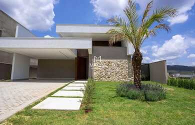 Imagem: A casa possui 4 Dormitórios, 5 Banheiros, 349m² de Área e