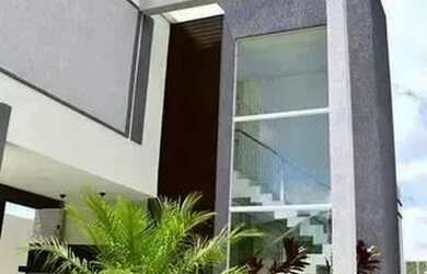 Imagem: A casa possui 3 Dormitórios, 3 Banheiros, 4 Vagas na garagem