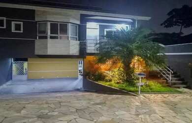 Imagem: A casa em condomínio possui 3 Dormitórios, 2 Banheiros, 4