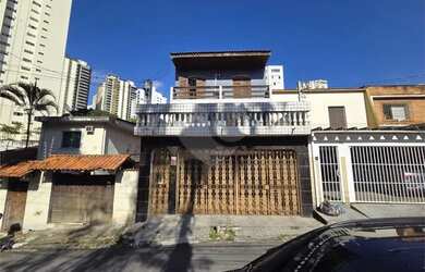 Imagem: A casa possui 5 Dormitórios, 4 Banheiros, 2 Vagas na garagem