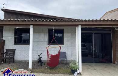 Imagem: A casa possui 2 Dormitórios, 1 Banheiro, 1 Vaga na garagem