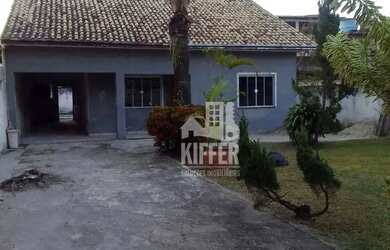 Imagem: A casa possui 3 Dormitórios, 3 Banheiros, 3 Vagas na garagem